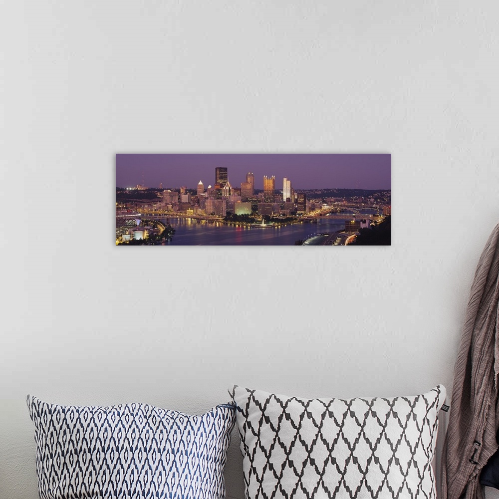 A bohemian room featuring This oversized wall art is a panoramic photograph of the cityos downtown captured from the south ...