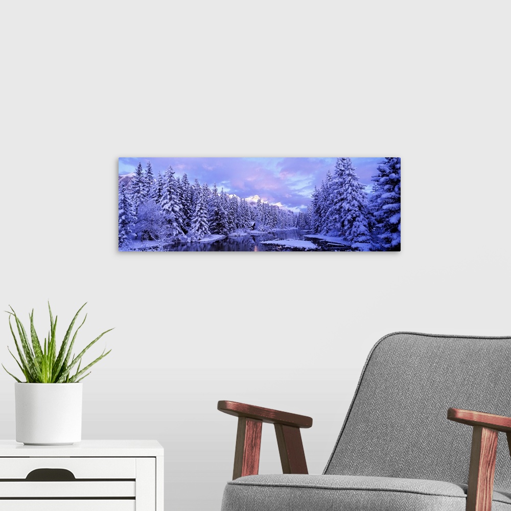 A modern room featuring Panoramic photograph looking down Policemans Creek, surrounded by a dense forest of snow covered ...
