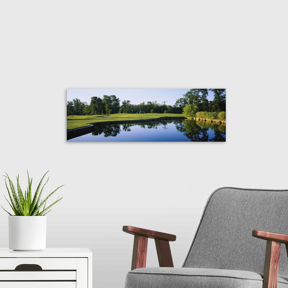 A modern room featuring Pond on a golf course, Salt Pond Golf Club, Delaware