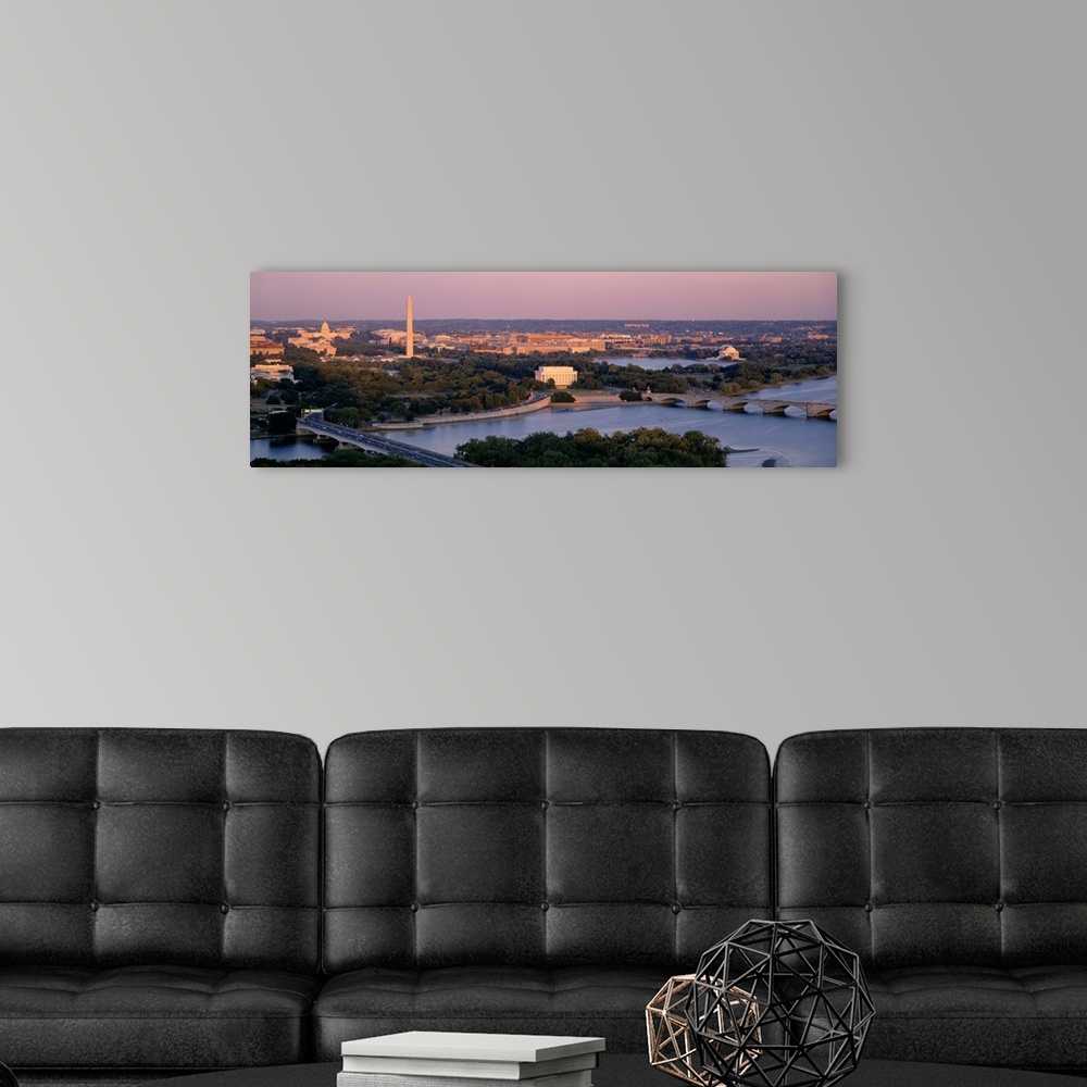 A modern room featuring Large panoramic photo art of the major monuments that make up the capitol of the United States at...