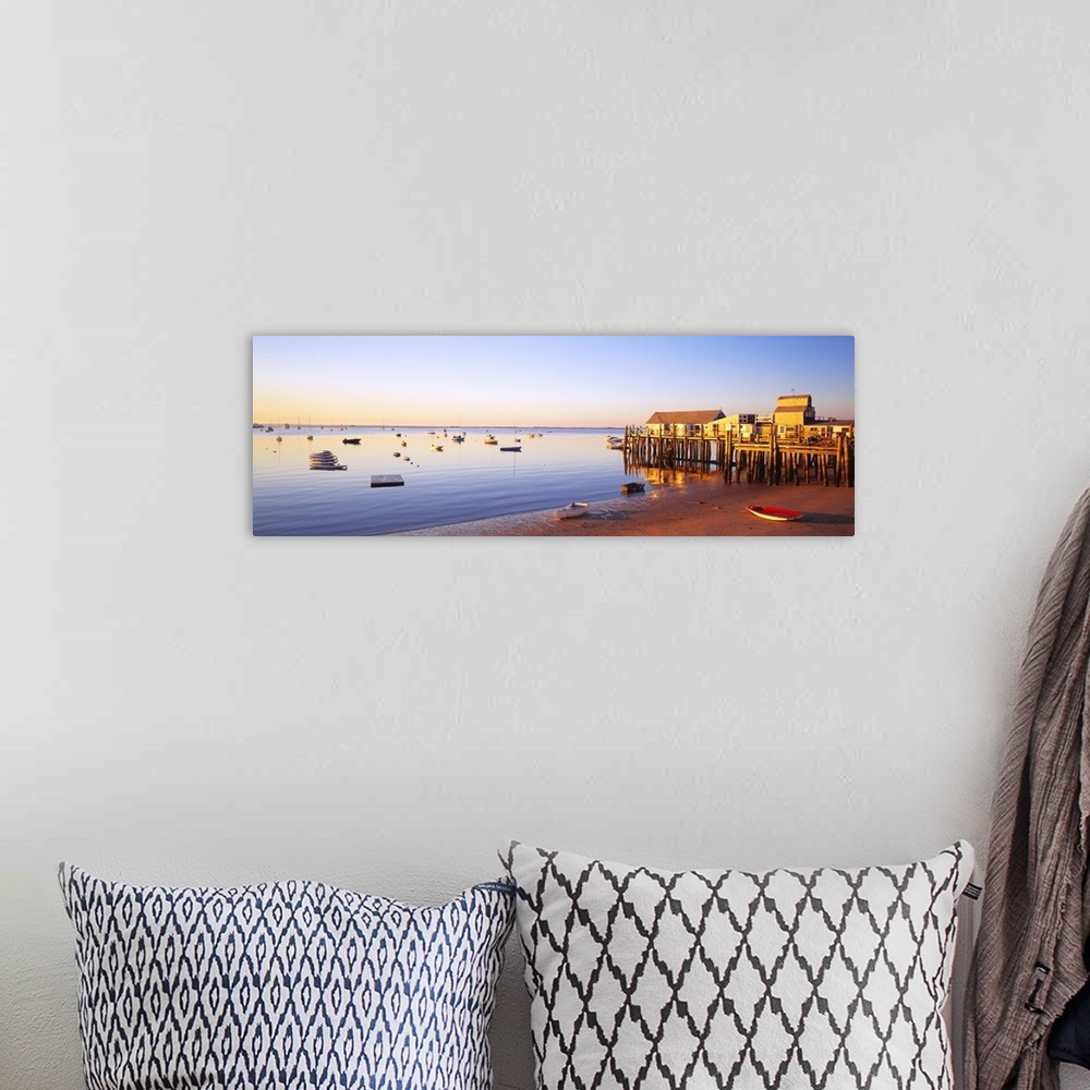A bohemian room featuring Picturesque panoramic photograph of a beach and small pier in Provinetown, Massachusettes. Small ...