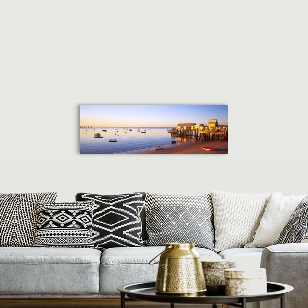 A bohemian room featuring Picturesque panoramic photograph of a beach and small pier in Provinetown, Massachusettes. Small ...