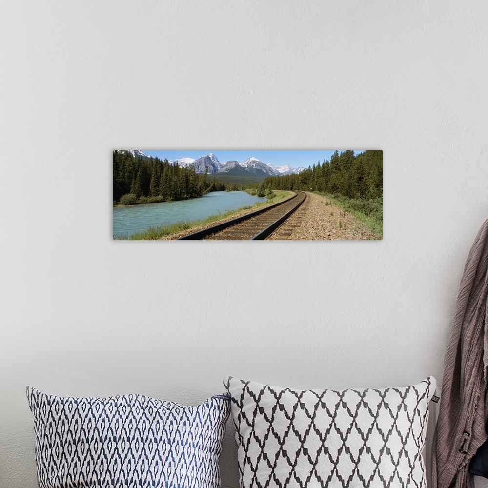 A bohemian room featuring Railroad Tracks Bow River Alberta Canada