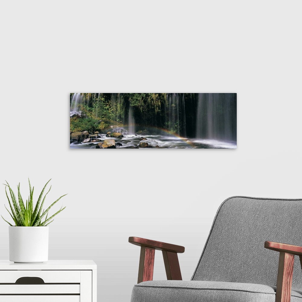 A modern room featuring Rainbow in front of a waterfall in a forest, Dunsmuir, Siskiyou County, California