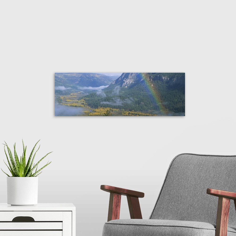A modern room featuring Rainbow over a valley, Conejos County, Colorado