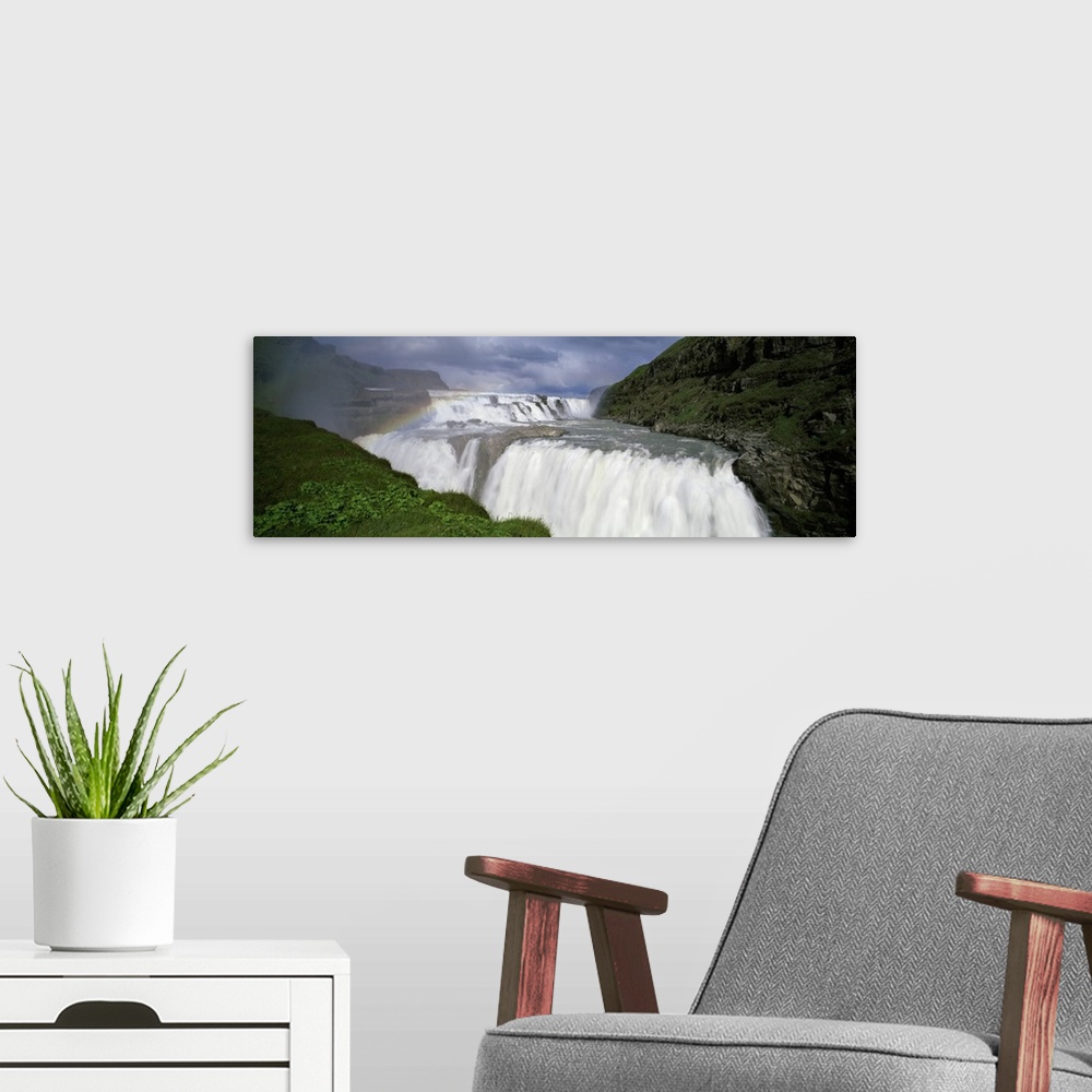 A modern room featuring Rainbow over Gullfoss or The Golden Waterfall, Iceland
