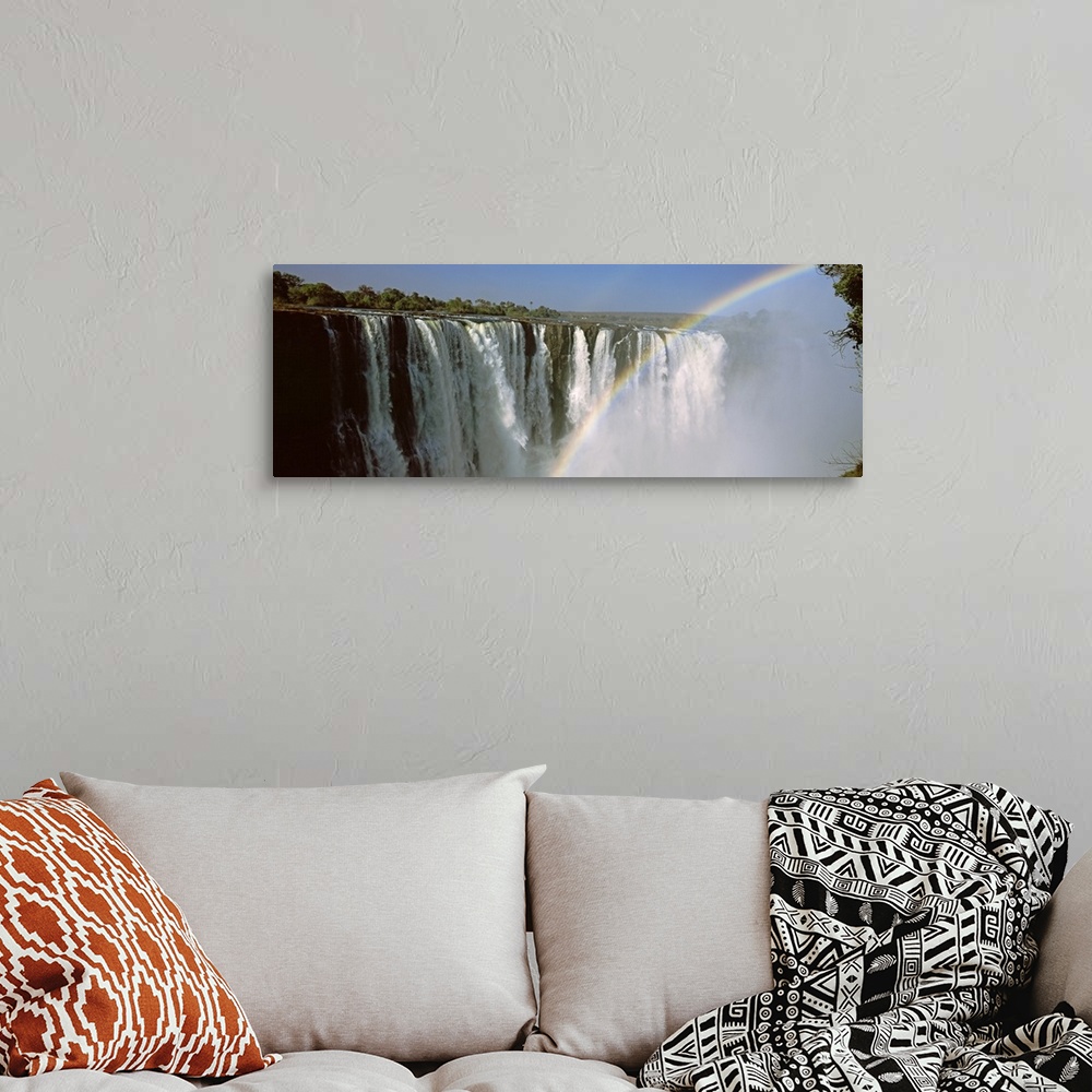 A bohemian room featuring Rainbow over Victoria Falls, Zimbabwe