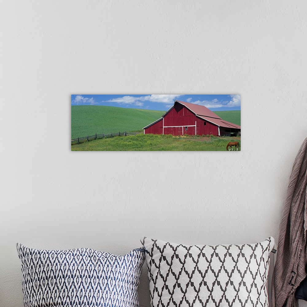 A bohemian room featuring Red Barn With Horses WA