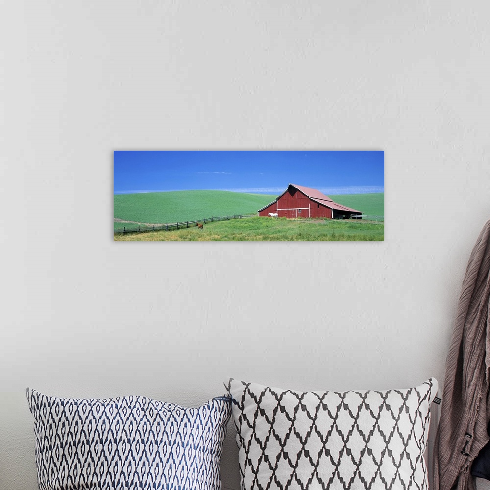 A bohemian room featuring Red Barn With Horses WA