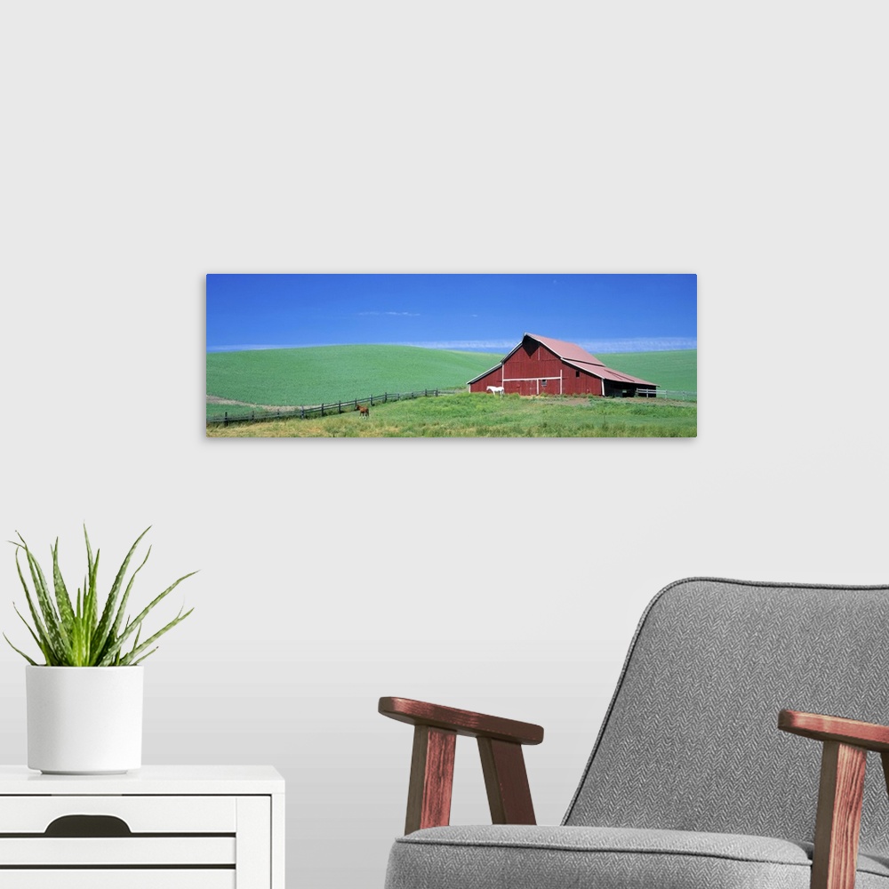 A modern room featuring Red Barn With Horses WA