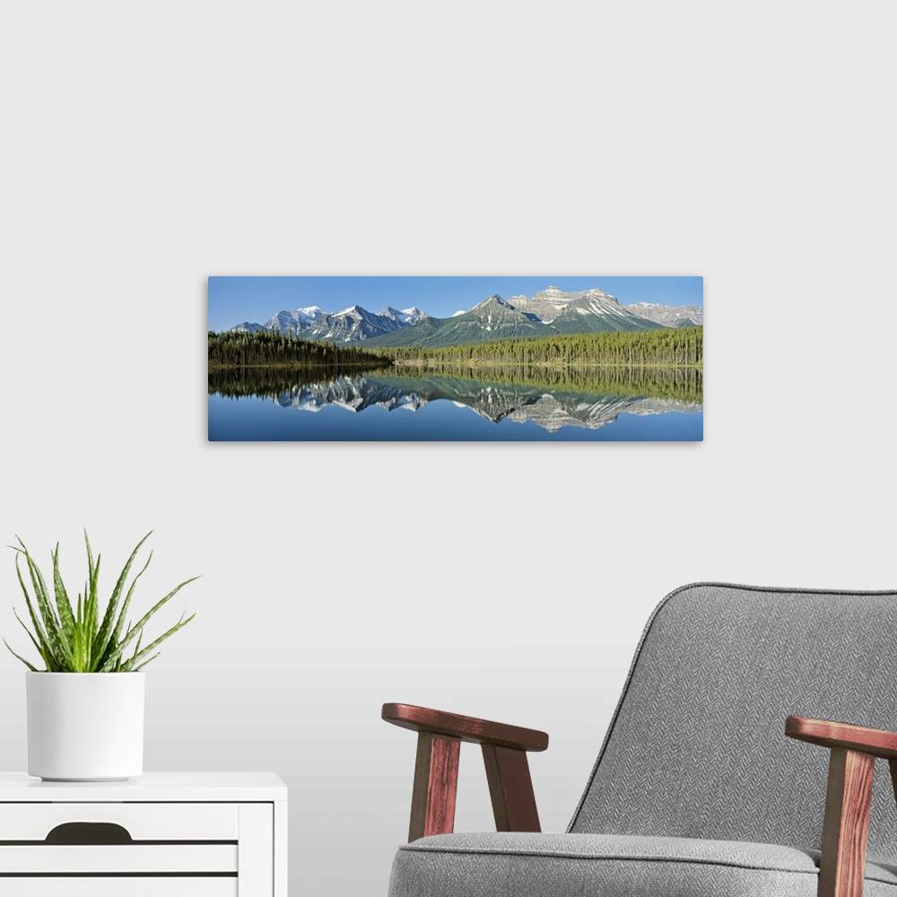 A modern room featuring Refection of mountains in water, Canadian Rockies, Canada