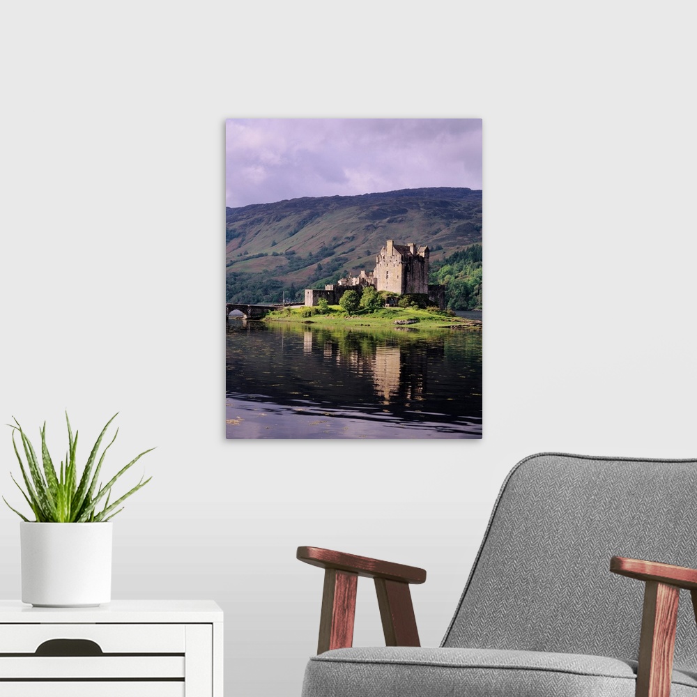A modern room featuring Reflection of a castle in water, Eilean Donan Castle, Highland Region, Scotland