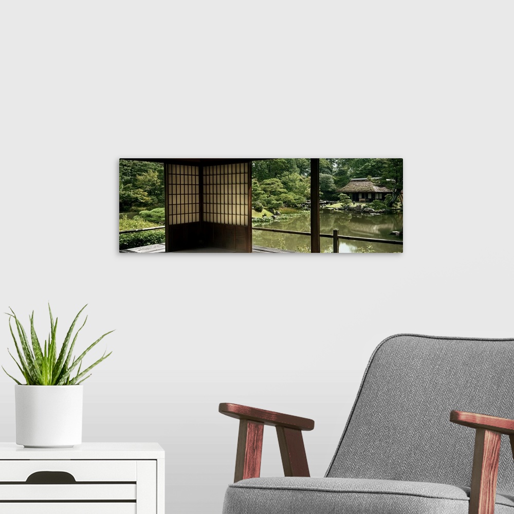 A modern room featuring Reflection of a house and trees on water, Katsura Imperial Villa, Kyoto, Japan