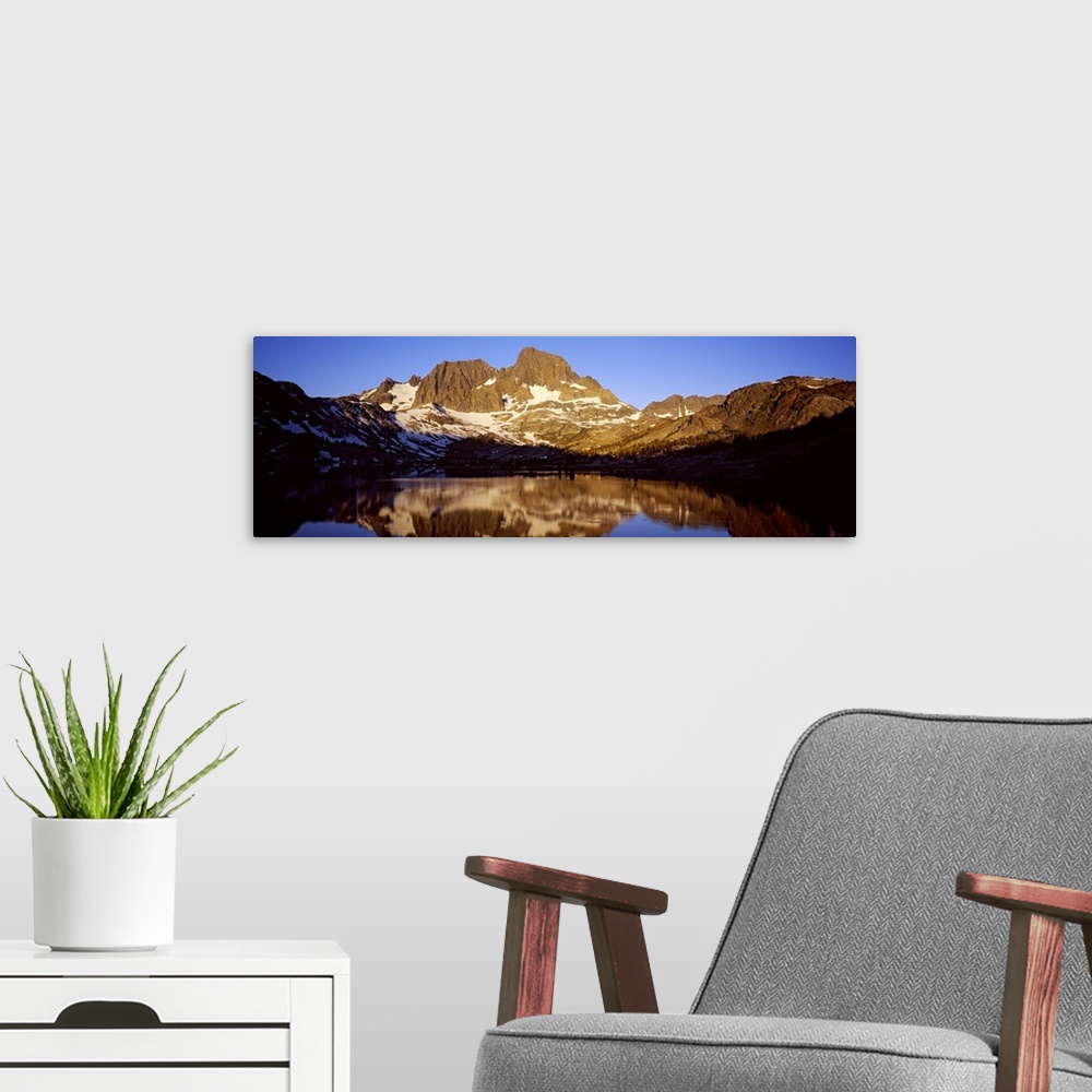 A modern room featuring Reflection of a mountain in a lake, Banner Peak, Thousand Island Lake, Ansel Adams Wilderness, Ca...