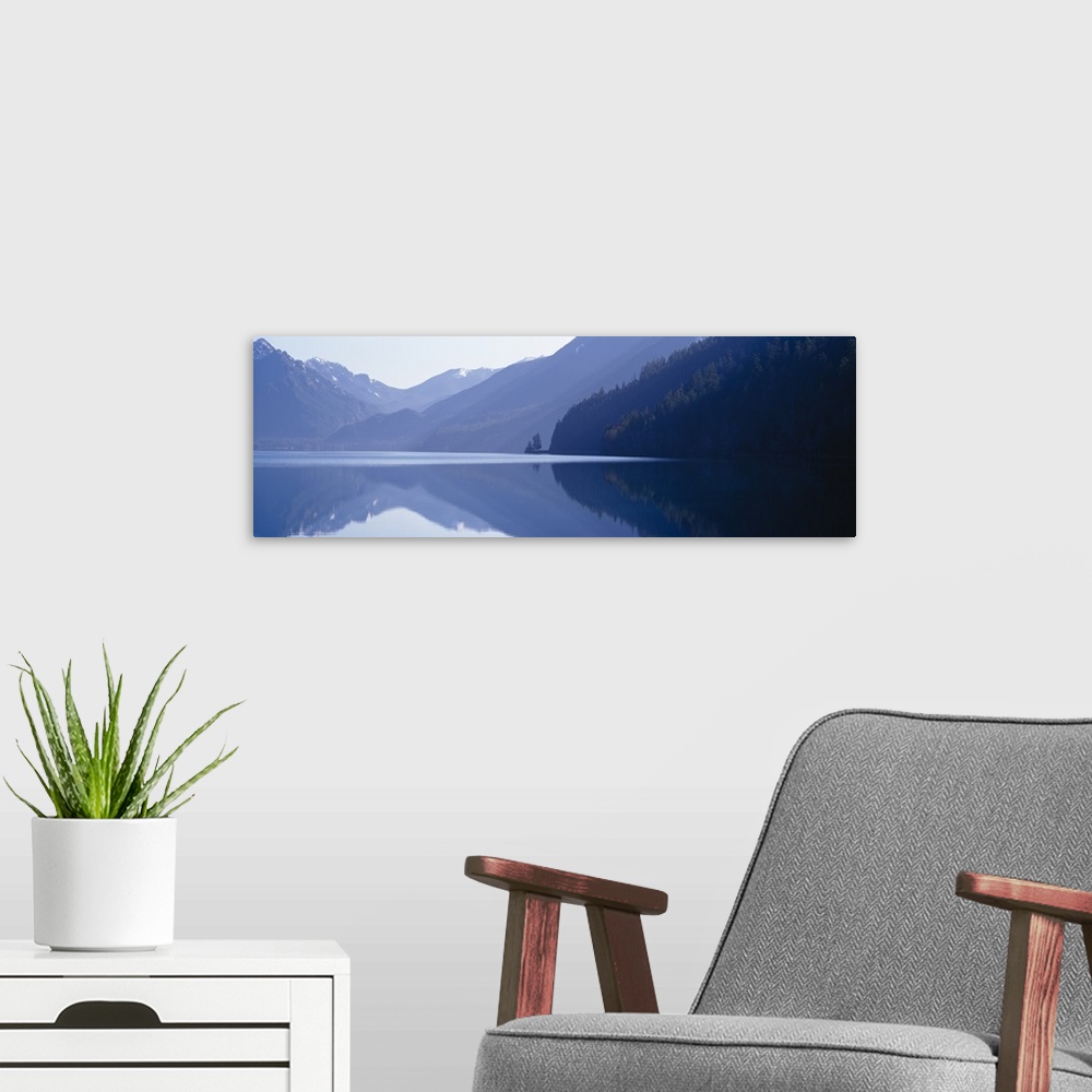 A modern room featuring Reflection of a mountain in a lake, Lake Crescent, Olympic National Park, Clallam County, Washing...