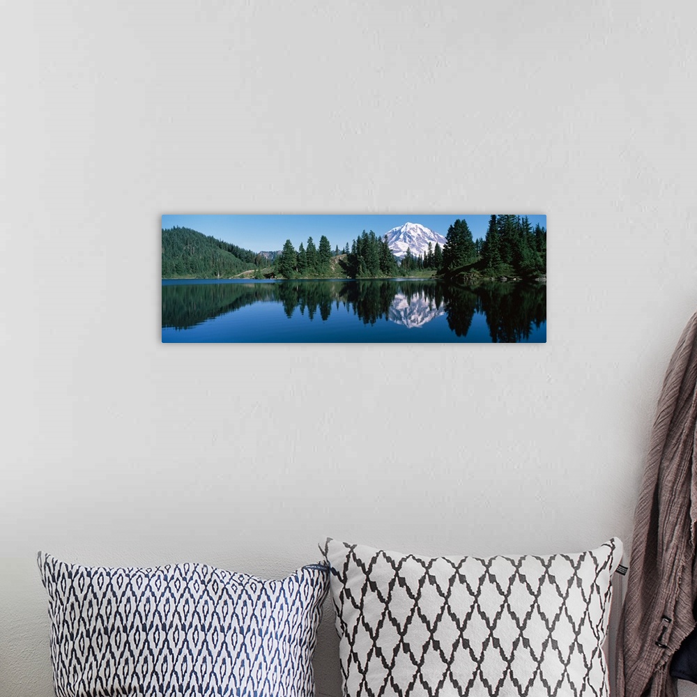 A bohemian room featuring Reflection of a mountain in a lake, Mt Rainier, Mt Rainier National Park, Pierce County, Washingt...