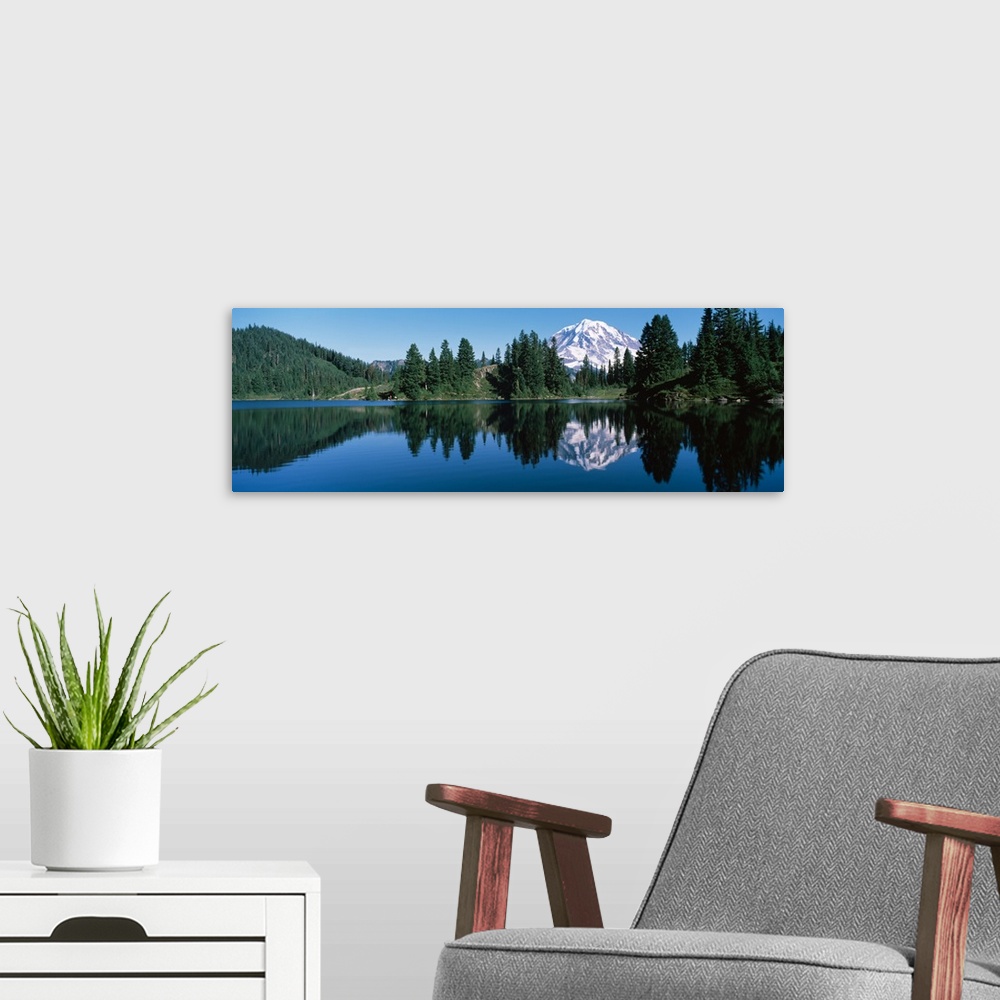 A modern room featuring Reflection of a mountain in a lake, Mt Rainier, Mt Rainier National Park, Pierce County, Washingt...