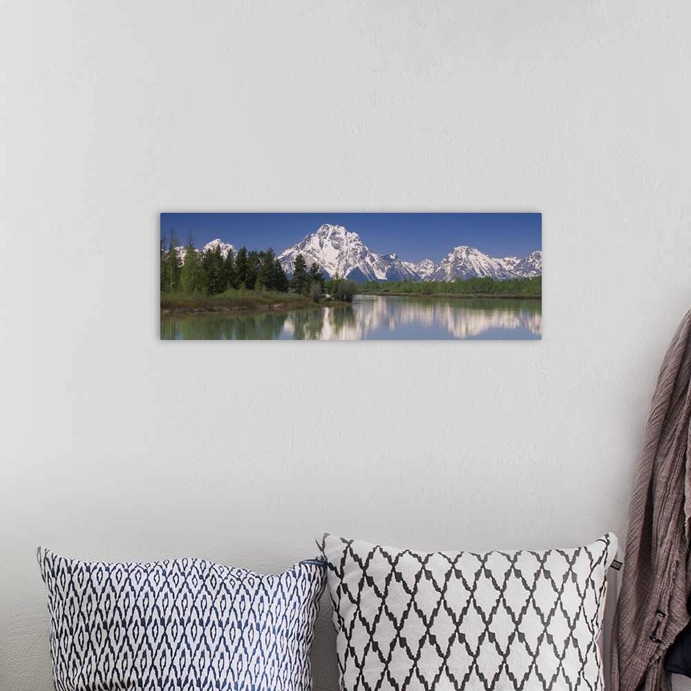 A bohemian room featuring Reflection of a mountain range in water, Oxbow Bend, Grand Teton National Park, Wyoming