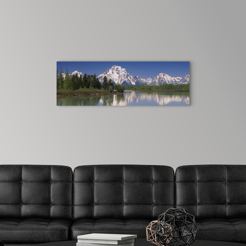 A modern room featuring Reflection of a mountain range in water, Oxbow Bend, Grand Teton National Park, Wyoming