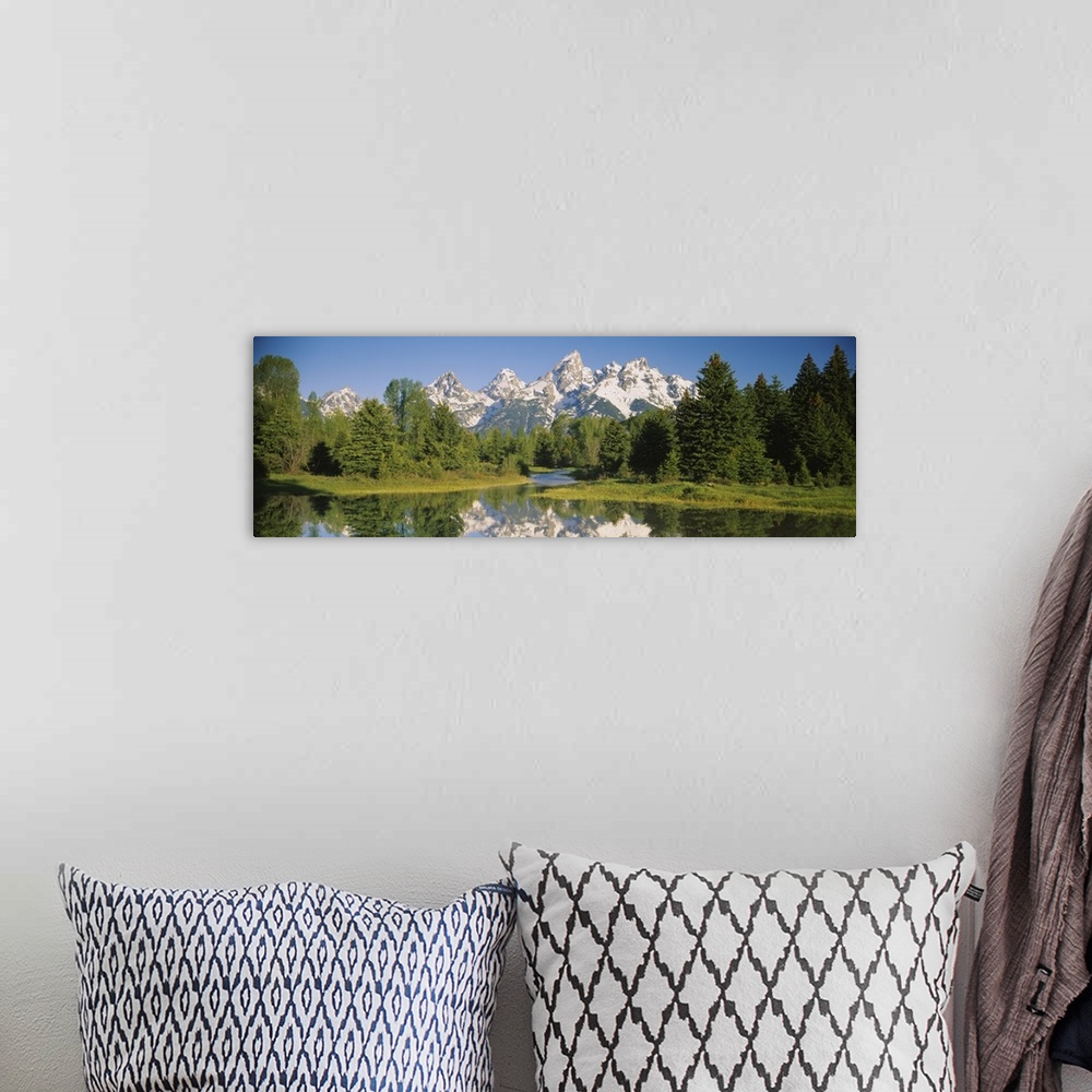 A bohemian room featuring Reflection of a snowcapped mountain in water, Near Schwabachers Landing, Grand Teton National Par...