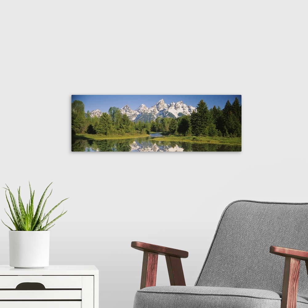 A modern room featuring Reflection of a snowcapped mountain in water, Near Schwabachers Landing, Grand Teton National Par...