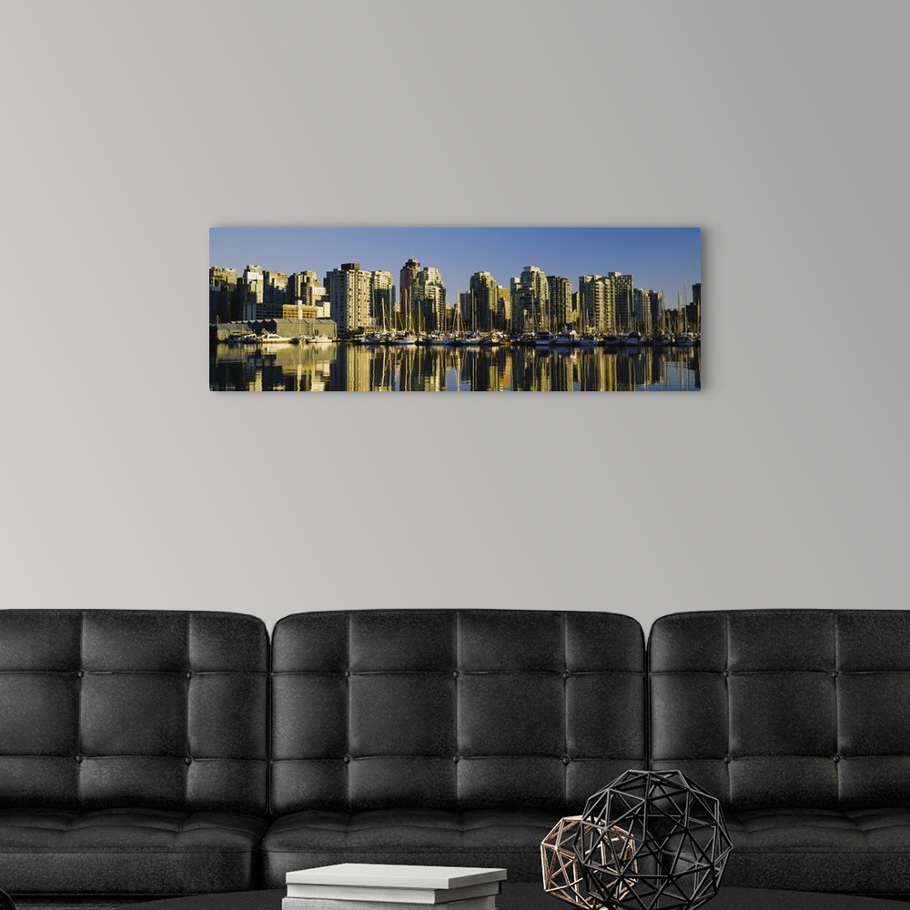 A modern room featuring Reflection of buildings in water, False Creek, Granville Island, Vancouver, British Columbia, Canada