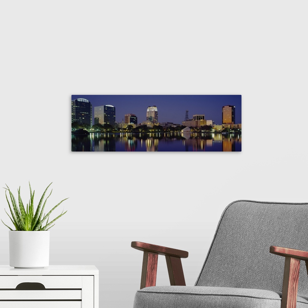 A modern room featuring Reflection of buildings in water, Orlando, Florida