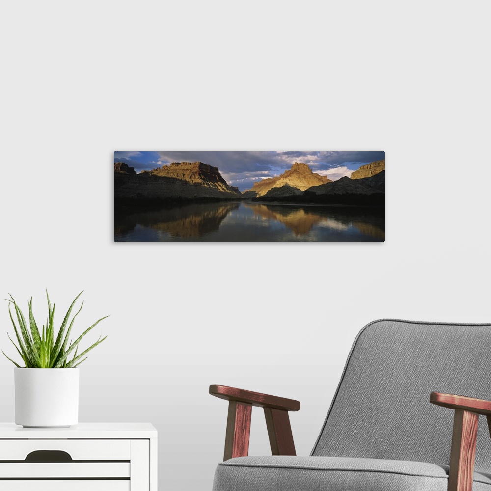 A modern room featuring Reflection of cliffs in river, Canyonlands National Park, Colorado River, Utah