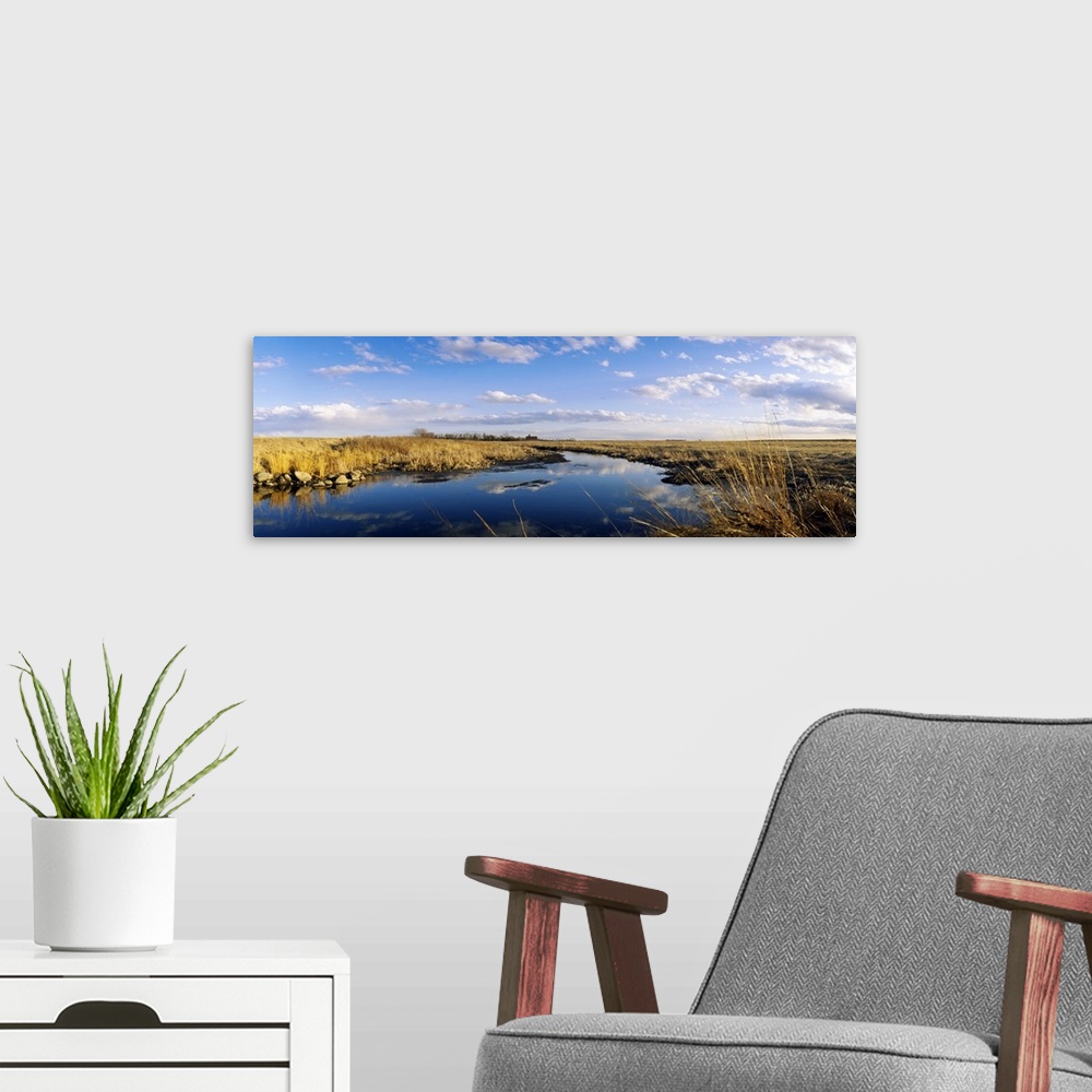 A modern room featuring Reflection of clouds in a lake, Prairie Pothole Region, North Dakota