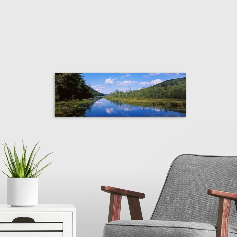 A modern room featuring Reflection of clouds in water, Oxbow Lake, Adirondack Mountains, New York State