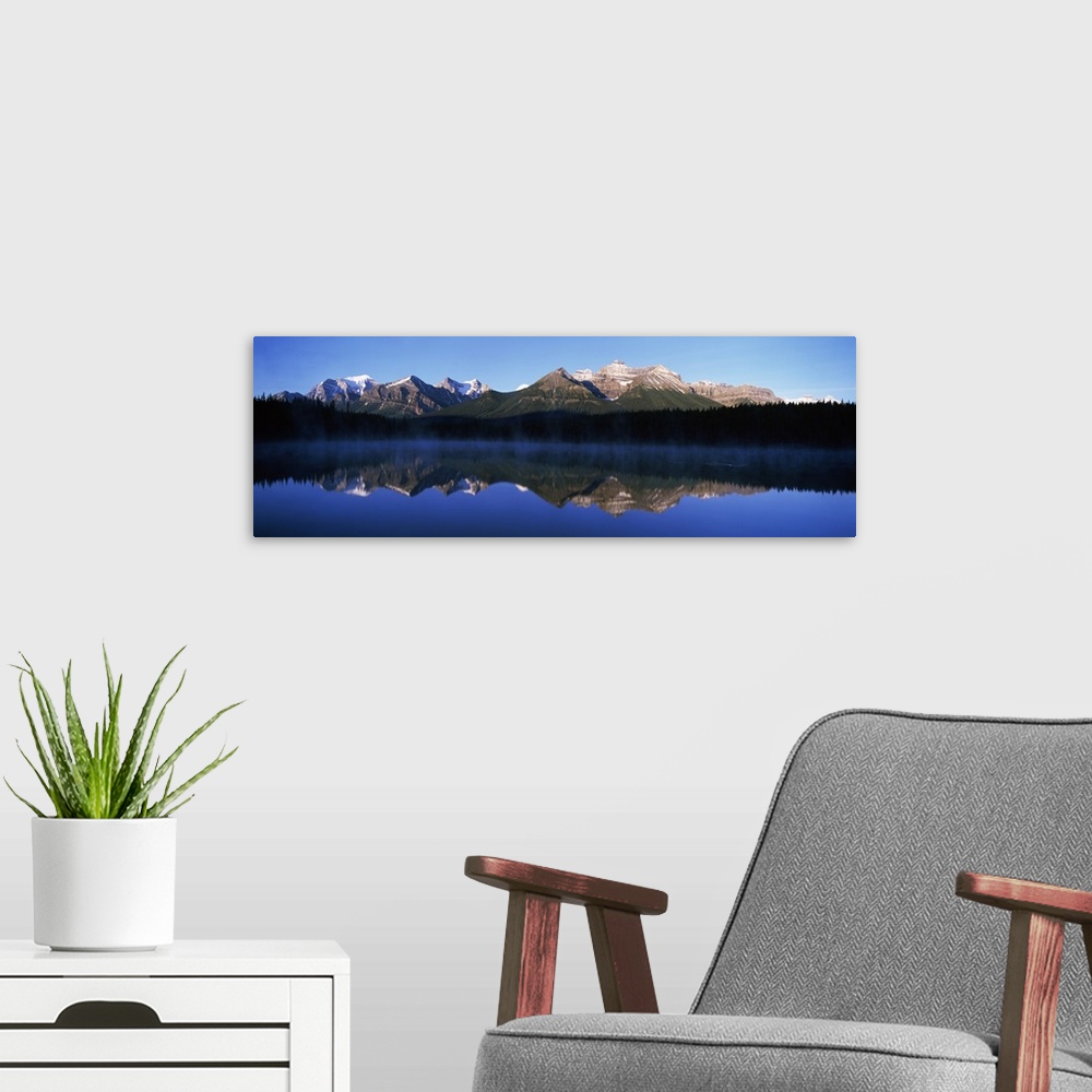 A modern room featuring Reflection of mountains in a lake, Lake Herbert, Banff National Park, Alberta, Canada