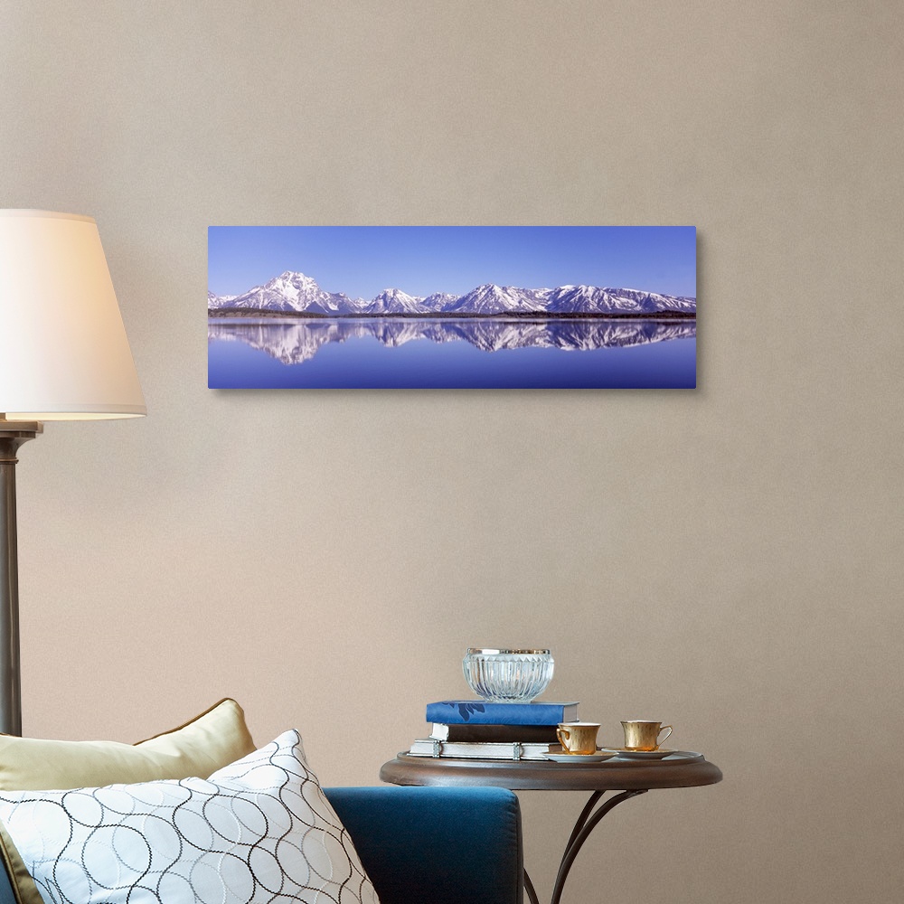 A traditional room featuring Reflection of mountains in a lake, Teton Range, Jackson Lake, Grand Teton National Park, Wyoming,