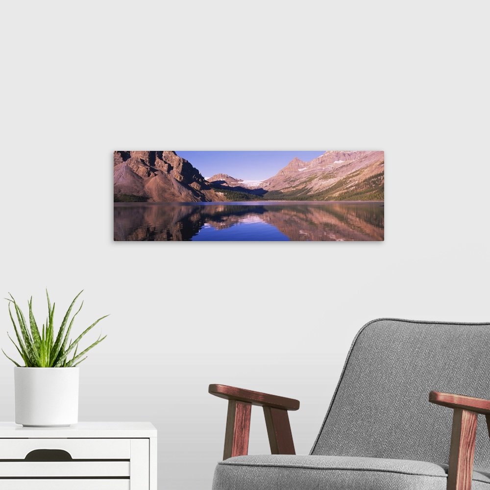 A modern room featuring Reflection of mountains in water, Bow Lake, Banff National Park, Alberta, Canada