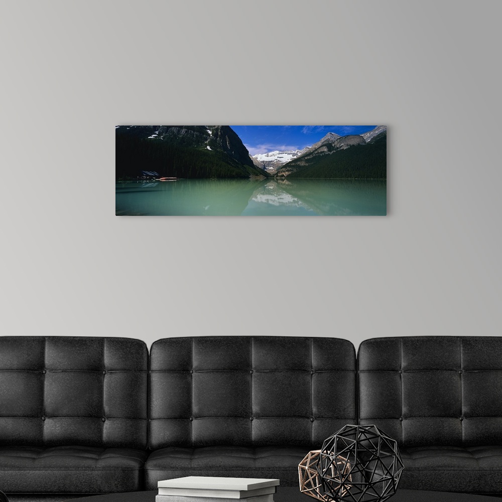 A modern room featuring Reflection of mountains in water, Lake Louise, Banff National Park, Alberta, Canada
