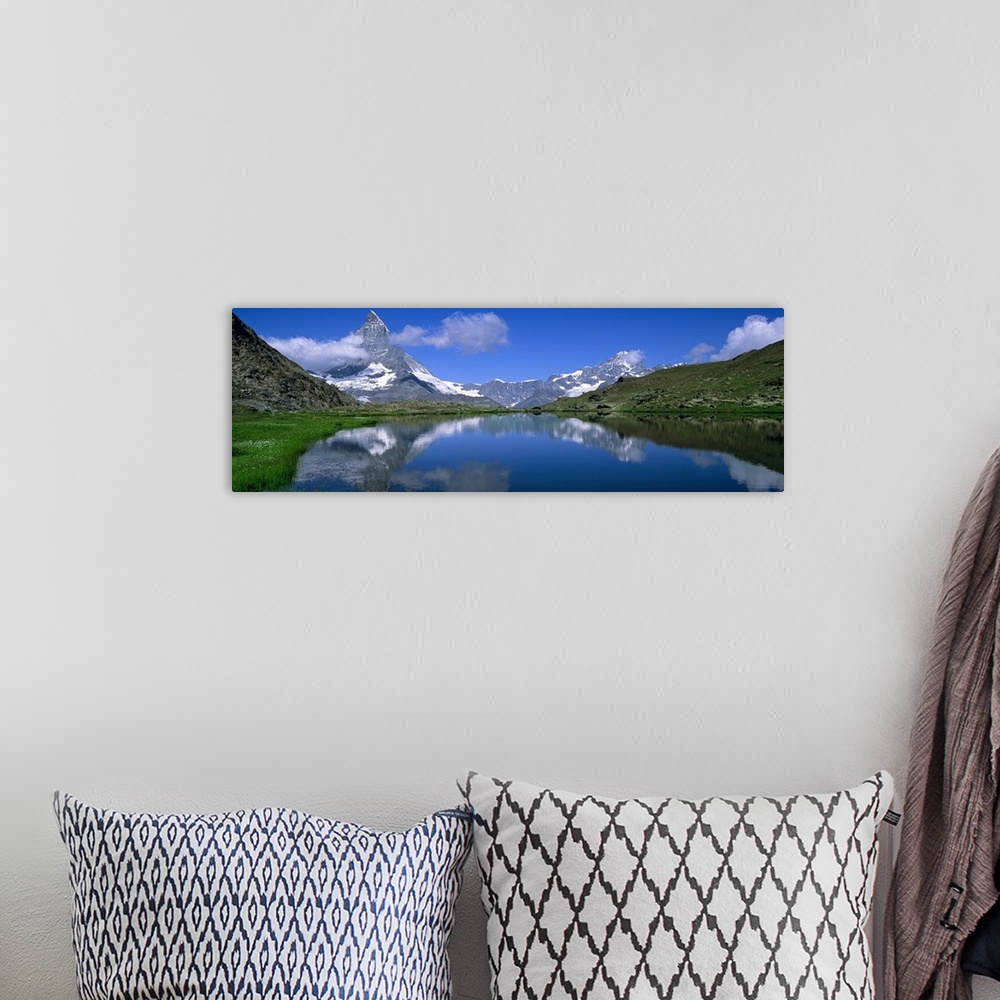 A bohemian room featuring Reflection of mountains in water, Riffelsee, Matterhorn, Switzerland