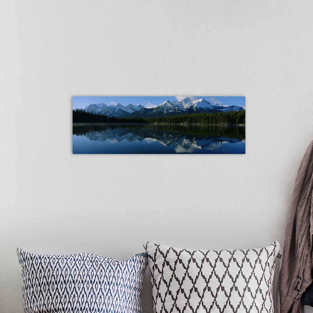 A bohemian room featuring Reflection of mountains on water, Herbert Lake, Banff National Park, Alberta, Canada
