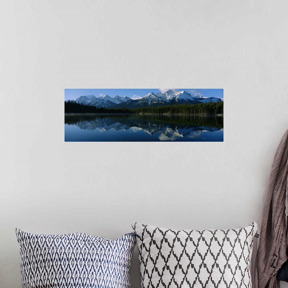 A bohemian room featuring Reflection of mountains on water, Herbert Lake, Banff National Park, Alberta, Canada
