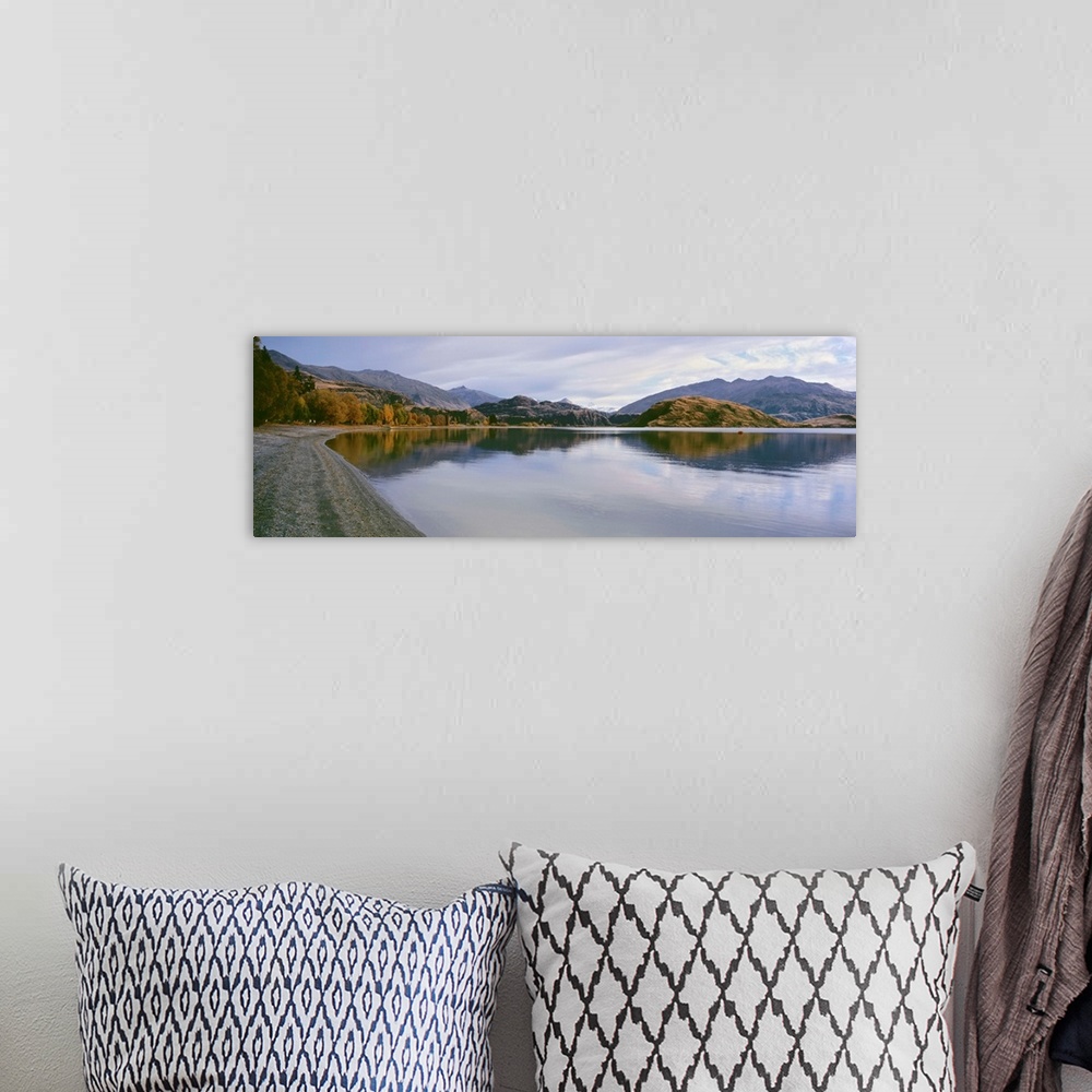 A bohemian room featuring Reflection of mountains on water, Mt Aspiring, Glendhu Bay, South Island, New Zealand