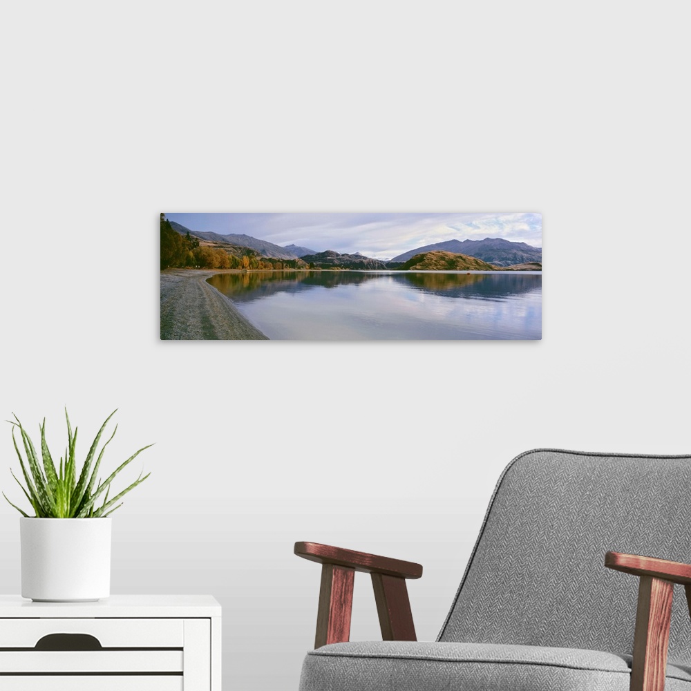 A modern room featuring Reflection of mountains on water, Mt Aspiring, Glendhu Bay, South Island, New Zealand