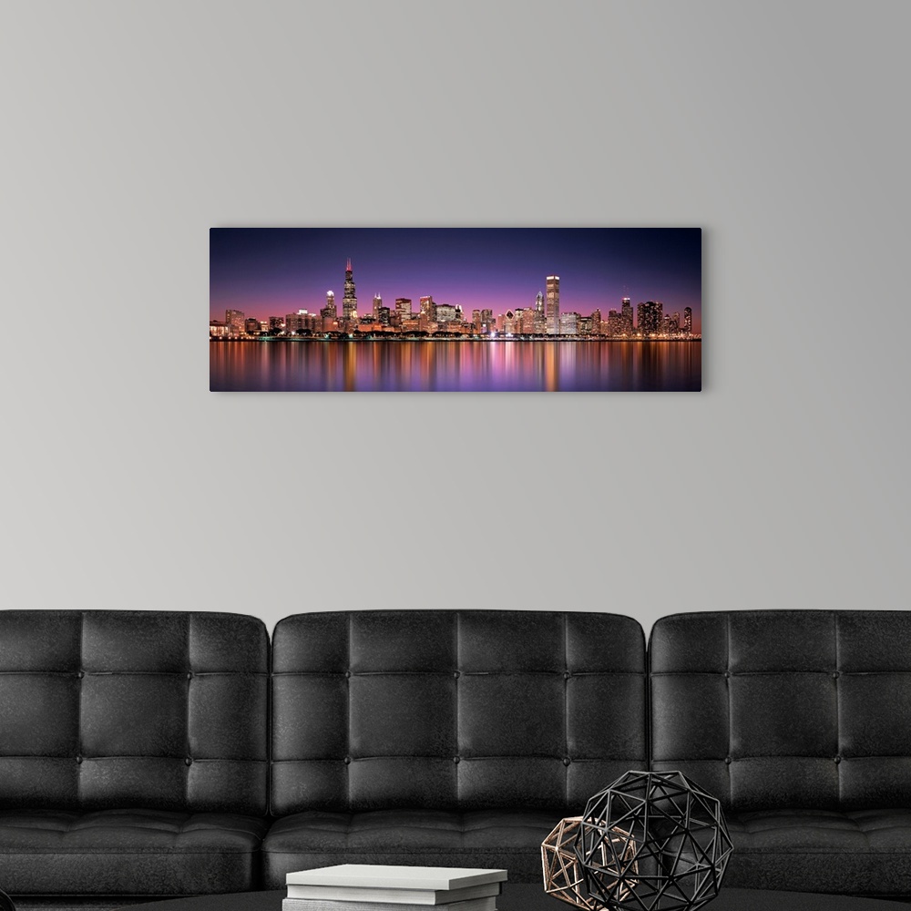 A modern room featuring Panoramic photograph of the Chicago, Illinois skyline filled with skyscrapers reflecting onto Lak...