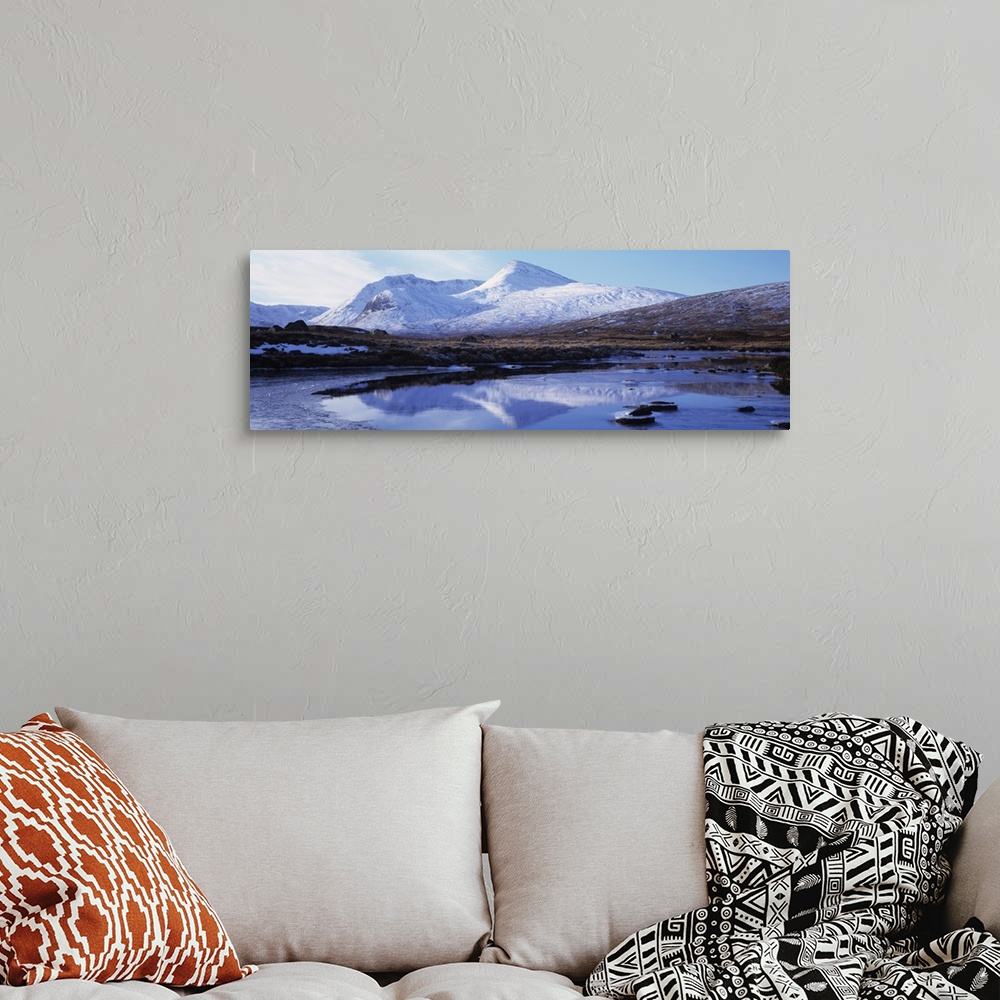 A bohemian room featuring Reflection of snow covered mountains in a lake, Black Mount, Lochan Na h'Achlaise, Rannoch Moor, ...