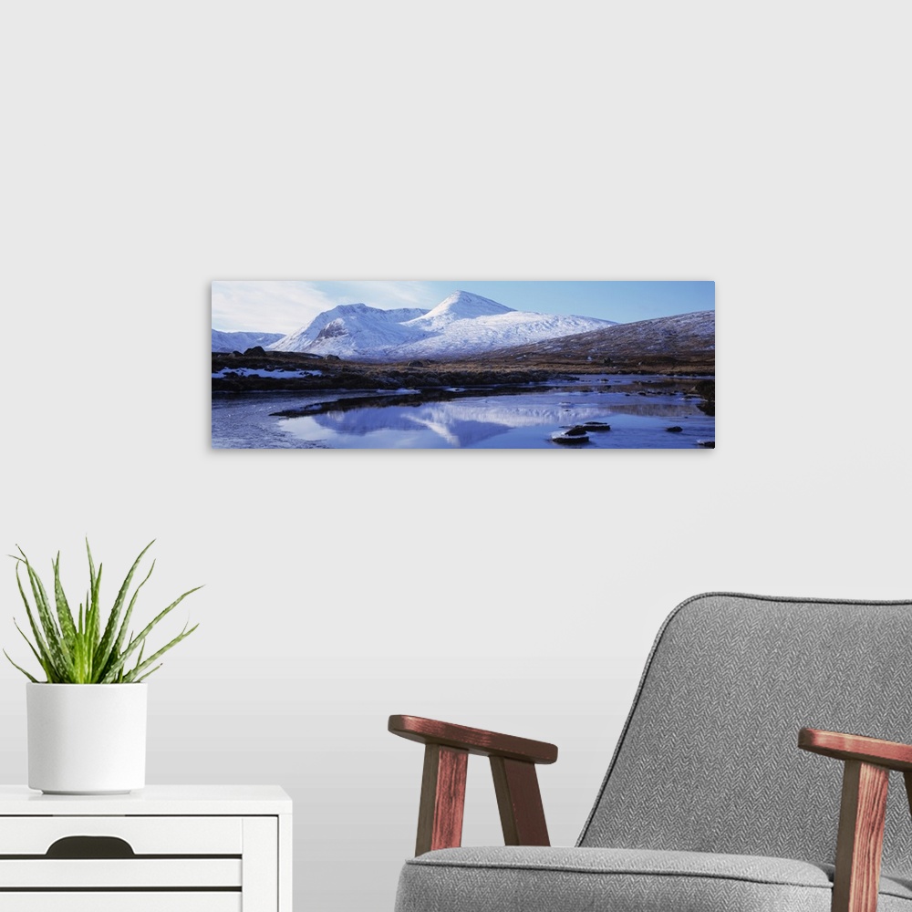 A modern room featuring Reflection of snow covered mountains in a lake, Black Mount, Lochan Na h'Achlaise, Rannoch Moor, ...