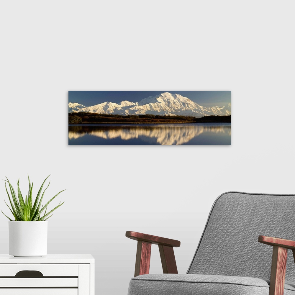 A modern room featuring Reflection of snow covered Mt McKinley in water, Denali National Park, Alaska