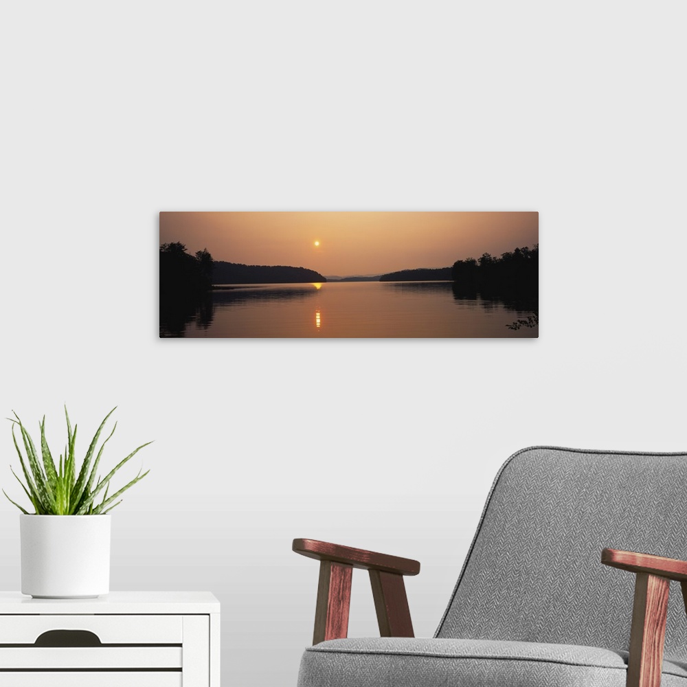 A modern room featuring Reflection of sun in a lake, Lake Chatuge, Western Mountains, North Carolina