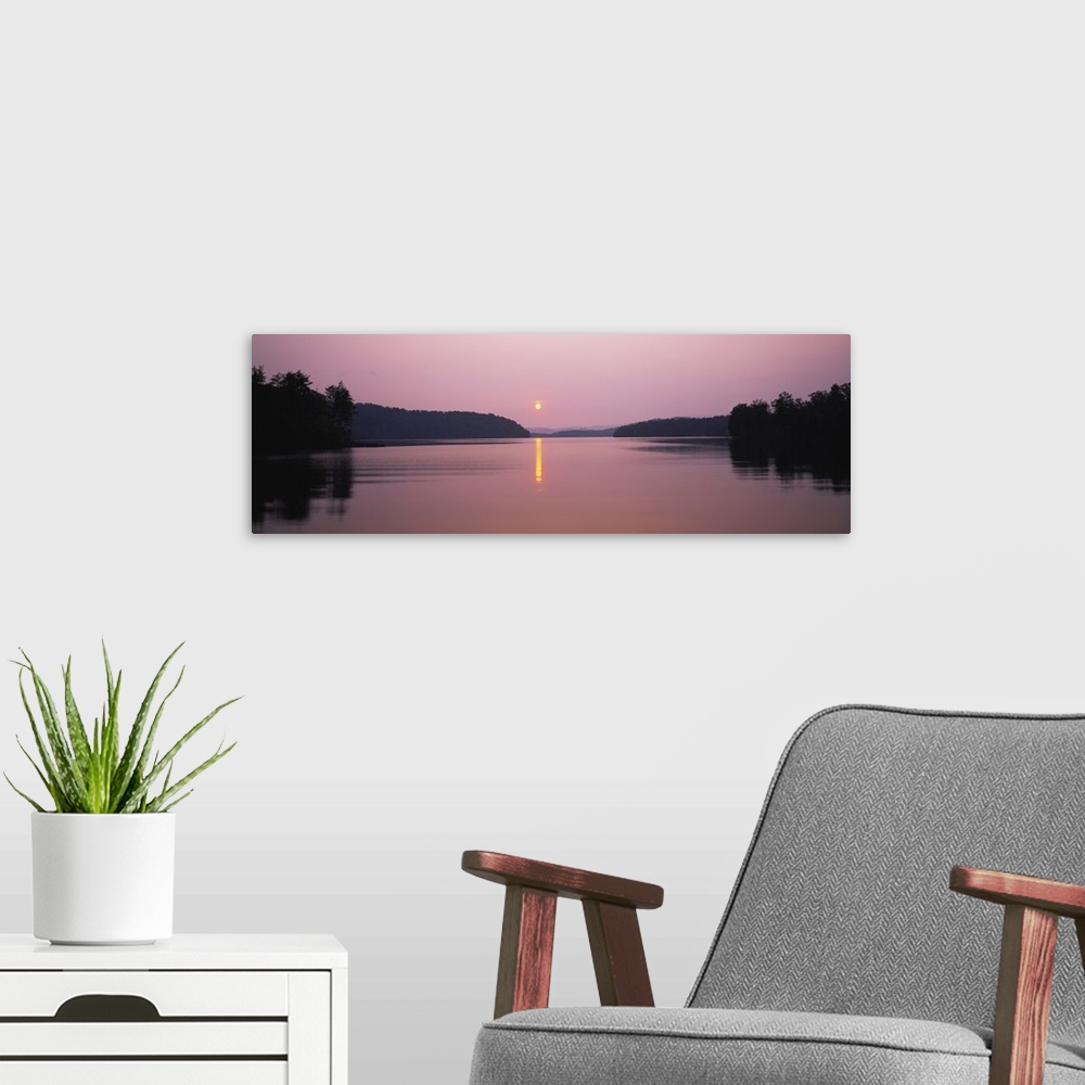 A modern room featuring Reflection of sun in a lake, Lake Chatuge, Western Mountains, North Carolina