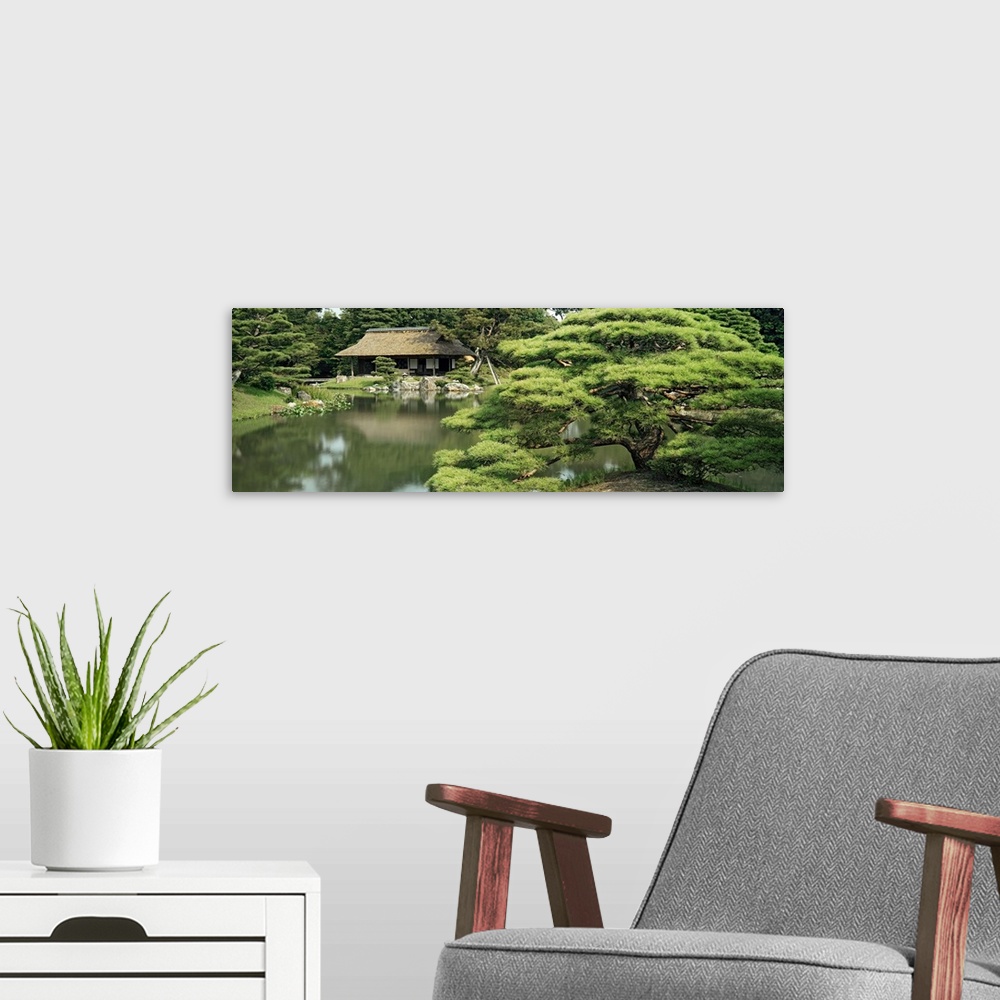 A modern room featuring Reflection of trees in water, Tea House, Imperial Gardens, Kyoto Prefecture, Honshu, Japan