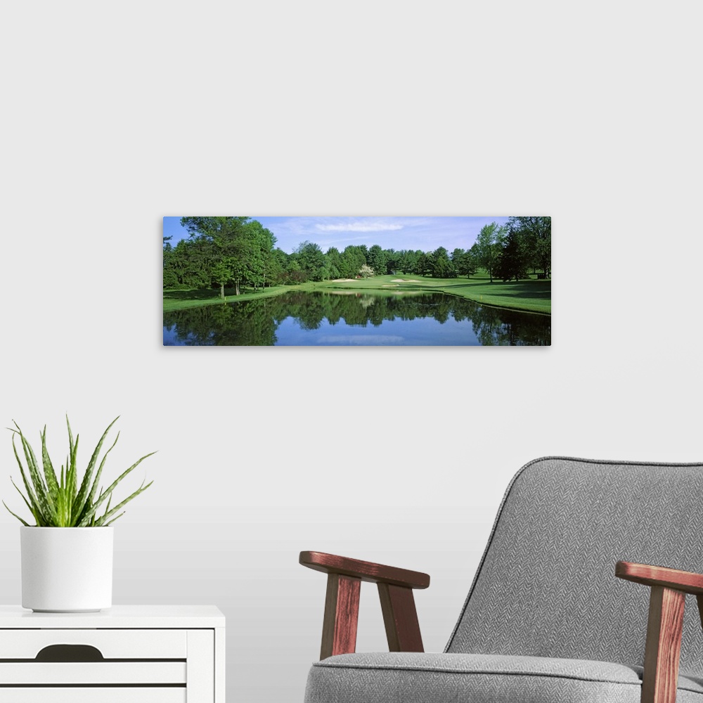 A modern room featuring Reflection of trees on water, Wilmington Country Club, Delaware