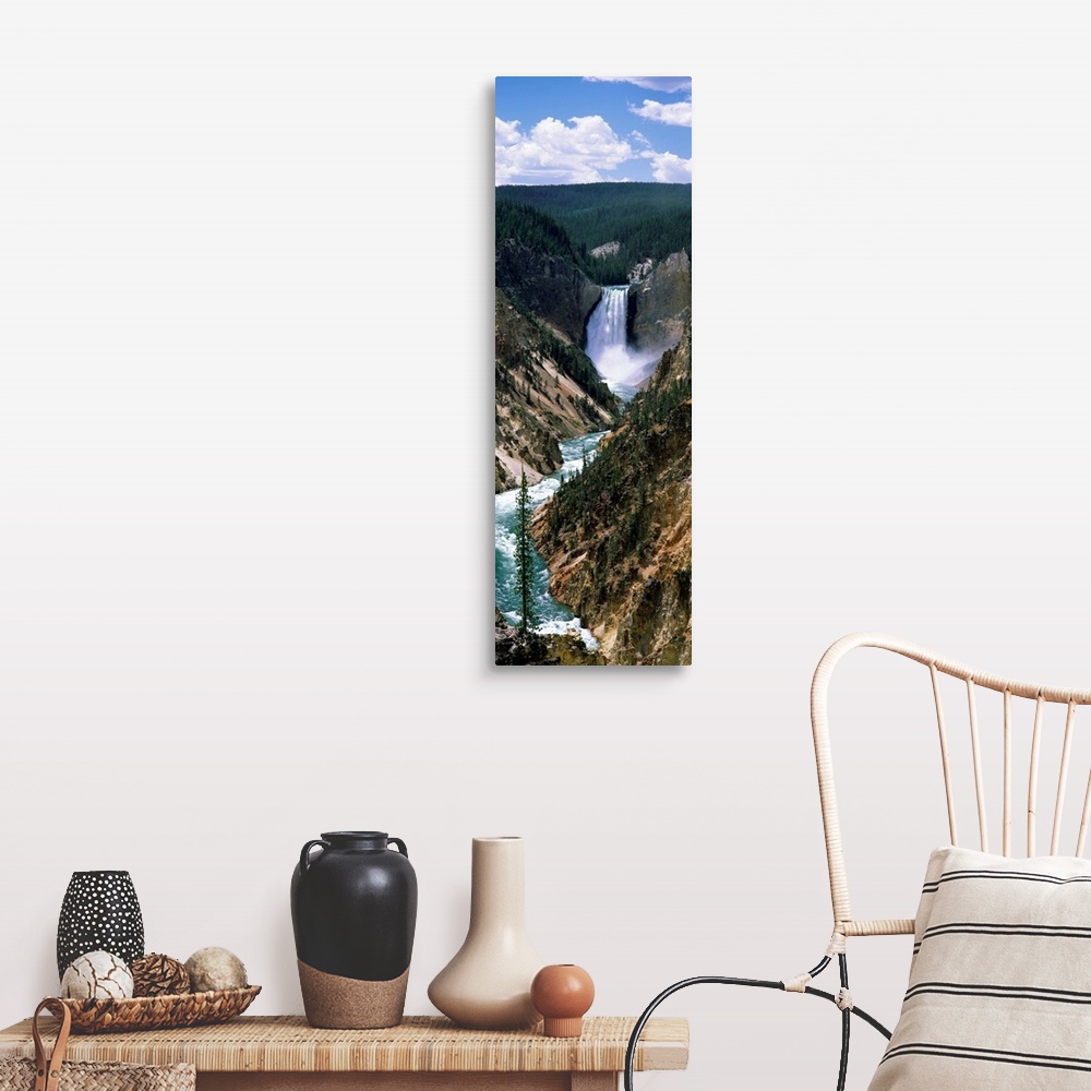 A farmhouse room featuring Vertical panoramic of a large waterfall at Yellowstone National Park in Wyoming.