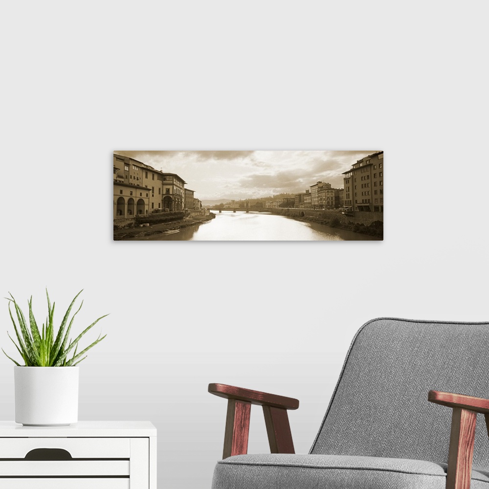 A modern room featuring River passing through a city, Arno River, Florence, Italy