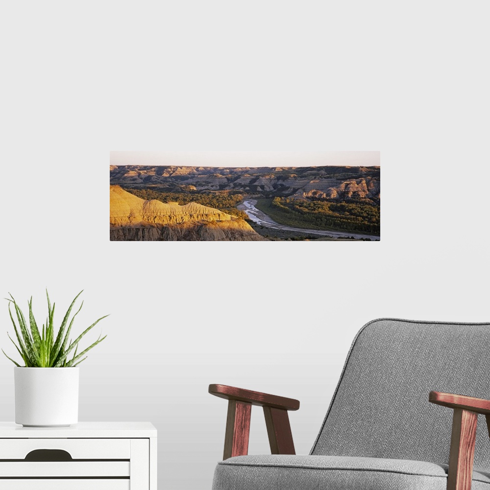 A modern room featuring River passing through a landscape, Little Missouri River, Badlands, Theodore Roosevelt National P...